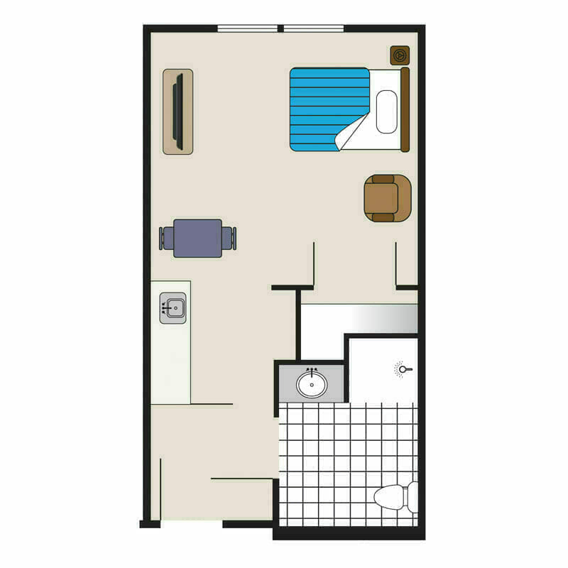 The efficient studio apartment layout at Mira Vie at Brookfield retirement community, offering designated living, sleeping, kitchen, and bathroom spaces for a comfortable senior living experience.