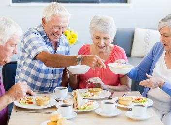Senior friends delight in shared meals at the Mira Vie Montville retirement community.
