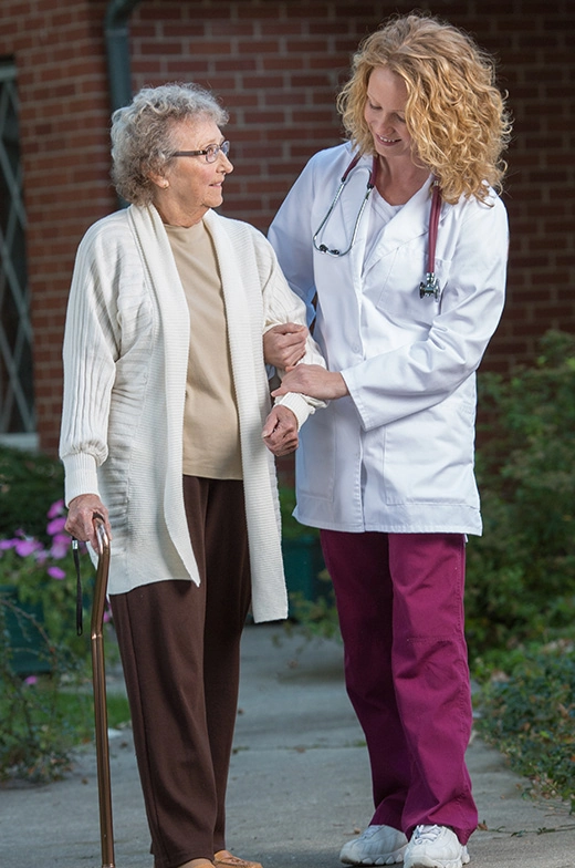 Our trained healthcare professionals provide quality respite care for seniors, ensuring their safe mobility with assistance for activities like walking outdoors.