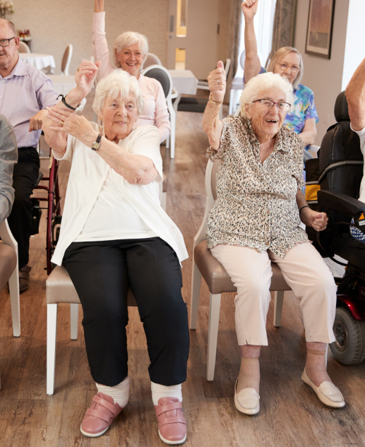 Active senior living at Mira Vie at Brick Retirement Community, where engaging chair exercises and fun dance activities keep our residents energetic. The joy of movement and arm raising workouts as part of an active and social lifestyle.