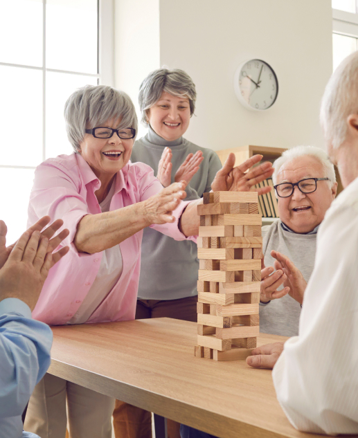 A spirited block-stacking game with fellow seniors at Mira Vie Retirement Community in West Milford. The community encourages fun activities designed for the social engagement of retirees.