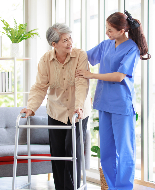 At Mira Vie Retirement Community in West Milford, our compassionate female healthcare professionals assist elder women with walkers.