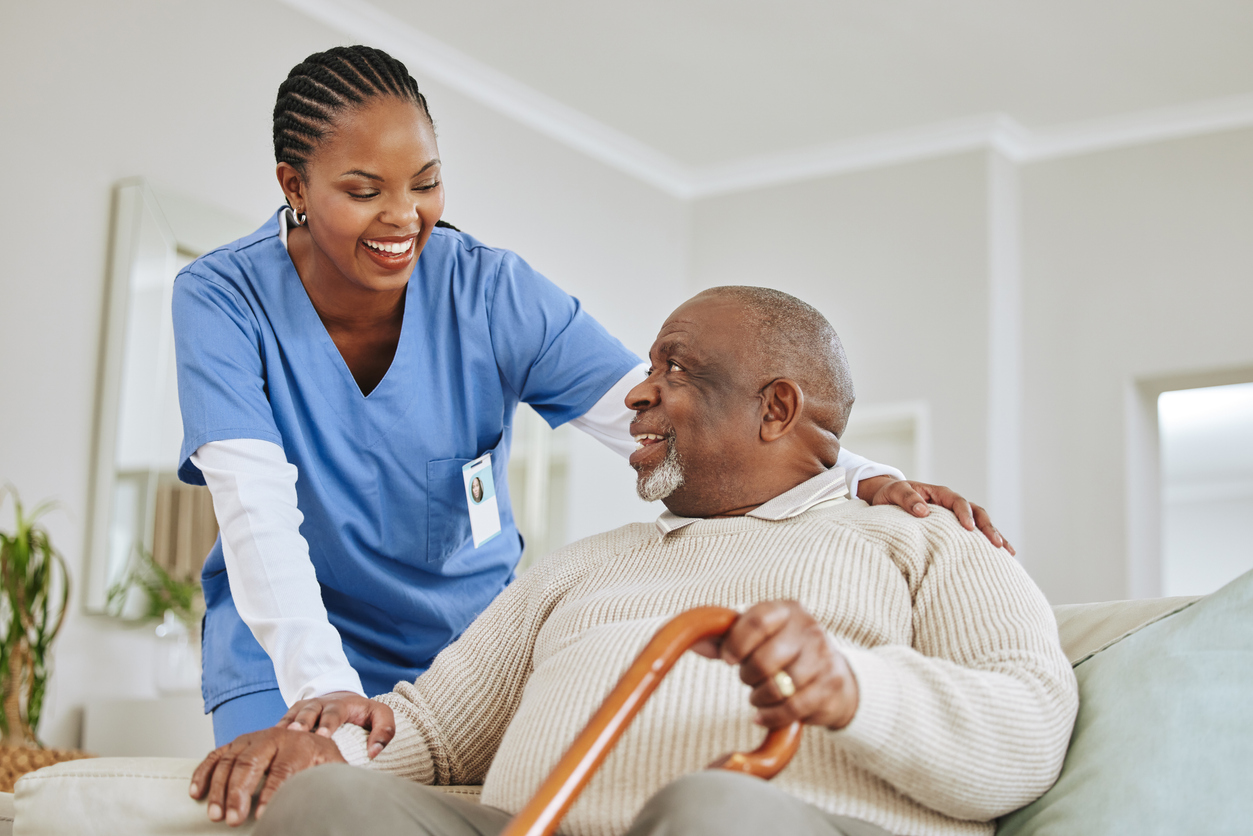 A nurse talking with a senior