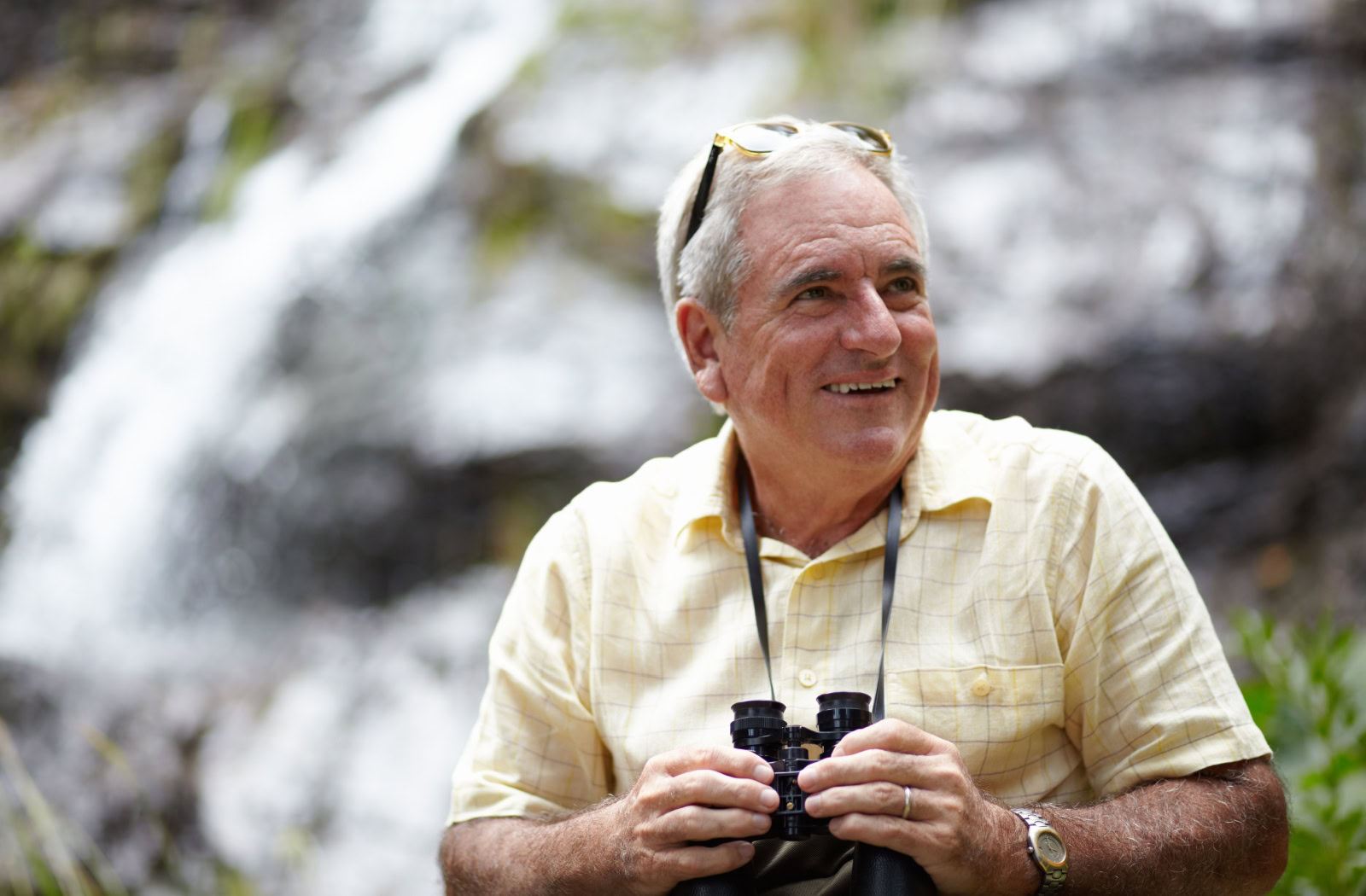 Birdwatching may seem like a pleasant pastime for idle hours, but it's much more. It's a fantastic way to stay active, enjoy quiet reflection, and gain a deeper appreciation for the natural world. Birdwatching offers the perfect blend of relaxation and engagement for older adults yearning for a serene yet stimulating hobby. A few things to consider when starting birdwatching as a relaxing hobby include getting the right gear and clothing to wear, learning about bird identification, and figuring out where to find birds to watch. This guide will walk you through everything you need to know to make the most of this rewarding activity. Gear Up for Your First Birdwatching Experience Reliable gear is key to a successful birdwatching adventure. As a beginner, you don't need to splurge, but starting with the right essentials goes a long way. Binoculars Invest in a pair of binoculars, as they are a birdwatcher's best friend. Choose ones with a magnification of 8x or 10x and an objective lens of 30mm or 42mm for sharp and clear visuals. Lightweight models are recommended—particularly for older adults—to prevent strain during prolonged use. Consider trusted brands like Nikon, Vortex, or Celestron for quality options. A Field Guide A field guide is essential for identifying birds. Look for one tailored to your region, such as the Peterson Field Guide to Birds of North America. Digital apps, such as Merlin Bird ID by the Cornell Lab of Ornithology, provide an easy-to-use and interactive alternative. Comfortable Outdoor Gear Comfortable, weather-appropriate clothing and sturdy walking shoes will prepare you for a day outdoors. Consider a backpack, a refillable water bottle, and sunscreen to keep yourself comfortable and hydrated. Notebook or Mobile App Documenting birds you see is part of the fun. Use a notebook to jot down details about species, locations, and details of your sightings. Alternatively, apps like eBird allow you to log sightings digitally while contributing to citizen science databases. Master the Basics of Bird Identification One of the excitements of birdwatching lies in identifying various species. This might initially sound overwhelming, but you'll get the hang of it with practice and a few helpful pointers. Size and shape: Compare the bird to familiar objects or species. For example, is it as small as a sparrow or as large as a crow? Plumage colors and patterns: Note the combinations of colors, head markings, wing bars, or tail stripes. Call and song: Each bird has its unique song or sound. Learning bird calls adds an extra layer of challenge but is rewarding. Apps like BirdNET can help you recognize bird sounds. Behavior: Observe how birds move and interact—are they flitting between branches, hovering in place, or foraging on the ground? Consistency is key. Before venturing into rarer species, observe common backyard birds like robins, sparrows, or bluejays. Where to Watch Birds Finding the right birdwatching locations is vital, and accessibility is essential, especially for older adults. The good news? Birds are everywhere, and exploring their homes is an excellent form of light cardio exercise in addition to the joy of the hobby. Start in Your Backyard Your backyard is a natural starting point. Install bird feeders, birdbaths, or native plants to attract various species. Watch as the local wildlife arrives right at your windowsill. Local Parks & Reserves Community parks, nature reserves, or wetlands are ideal birdwatching spots. When planning your visit, check for accessible pathways, benches, and restroom facilities. Some senior-friendly parks even offer guided birdwatching walks. Botanical Gardens or Arboretums These tranquil locations are havens for birds and often offer paved trails, shaded areas, or even cafes—all senior-friendly perks. National Wildlife Refuges National wildlife refuges are excellent options for those seeking a more immersive experience. Many provide mobility-friendly trails and viewing areas specifically designed for wildlife enthusiasts. Birdwatching Etiquette for Responsible Enjoyment While birdwatching is a low-impact hobby, respecting nature and fellow enthusiasts is important. Here's a quick etiquette guide for your outings: Keep quiet: Birds are sensitive to noise. Speak softly and avoid sudden movements. Respect spaces: Stay on designated paths to avoid disturbing habitats and damaging vegetation. Don't feed birds: Resist the urge to offer food to wildlife. It can harm their natural foraging habits. Leave no trace: Carry all trash out to preserve the natural environment. Be patient: Birdwatching is about immersing yourself in the moment, so embrace the pauses and calm surroundings. Stay Safe While You Birdwatch For older adults, a few precautions ensure a safe and worry-free birdwatching experience: Prepare in advance: Check weather conditions, bring plenty of water, and carry a mobile phone for emergencies. Stay sun-safe: Wear a wide-brimmed hat, sunglasses, and sunscreen to protect against prolonged sun exposure. Pack light: Use lightweight gear to avoid straining yourself while on the move. Stick with a buddy: Birdwatching is more fun and safer with a companion. Start Your Birdwatching Adventure Today Birdwatching is more than just a hobby. It's an invitation to slow down, connect with nature, and find joy in the small wonders of life. With the right equipment, basic bird identification skills, and access to local or virtual communities, you'll find no shortage of opportunities to immerse yourself in this rewarding activity. Call our team at Mira Vie today. We'd love to chat about the many communities we have that you can call home. And if birdwatching is your passion, we can help you find a community that will provide you with these opportunities!