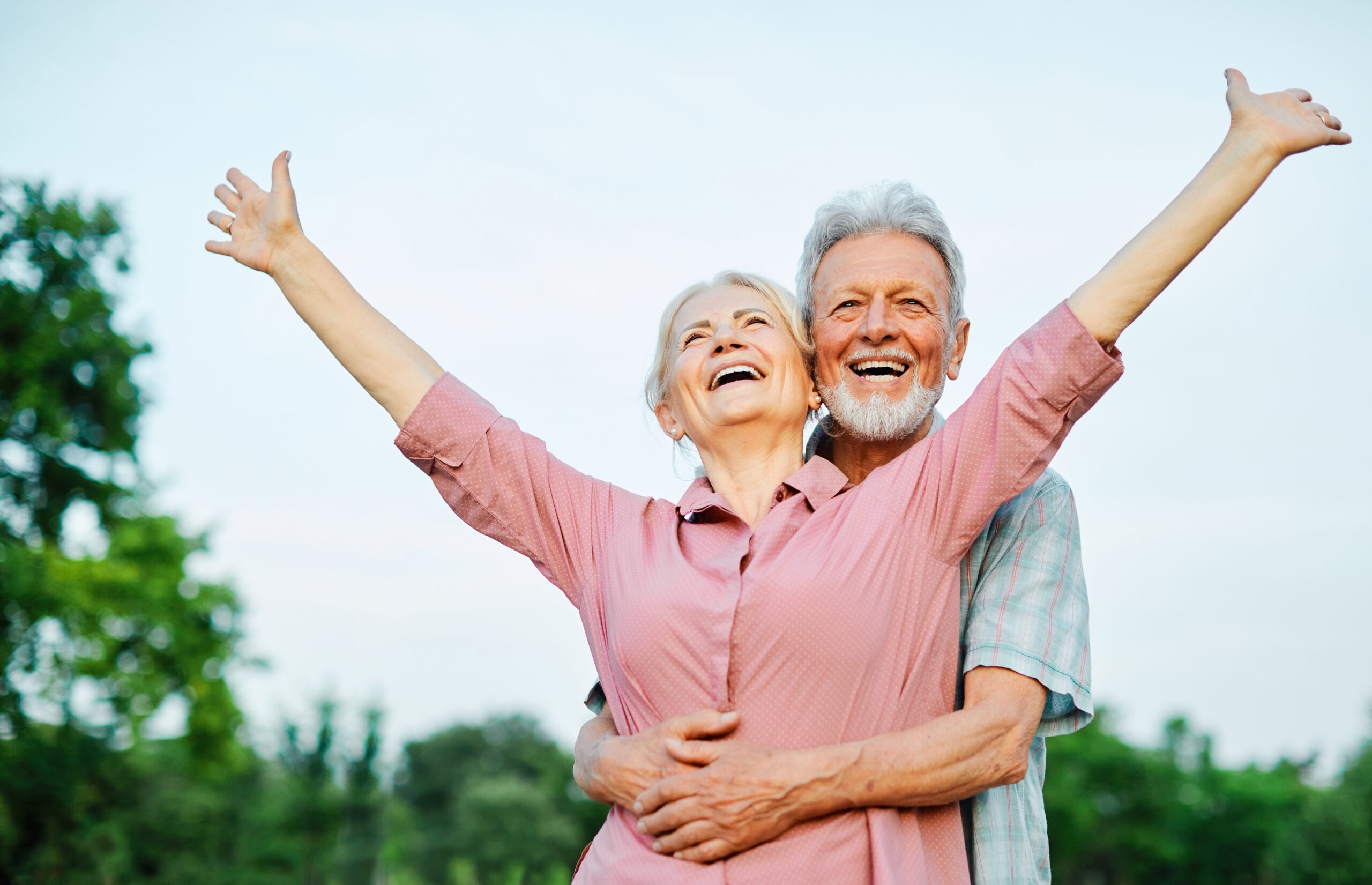 Happy senior couple enjoying time together at an assisted living home.